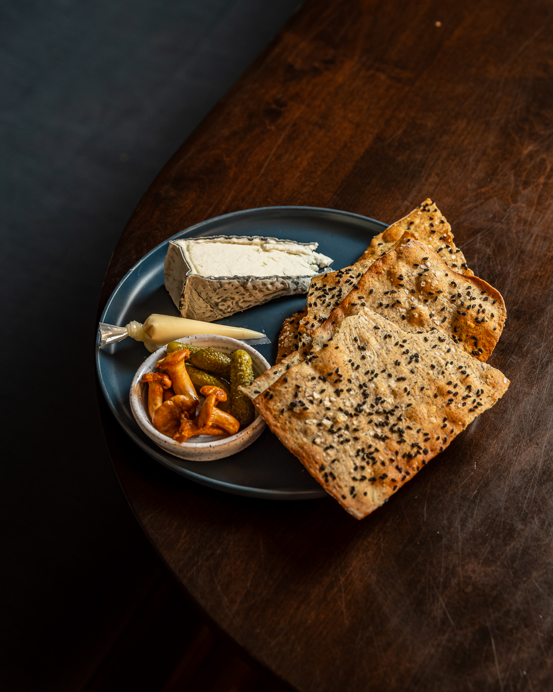 Grey Owl Cheese Plate w/ buckwheat lavash, lemon purée, and pickles