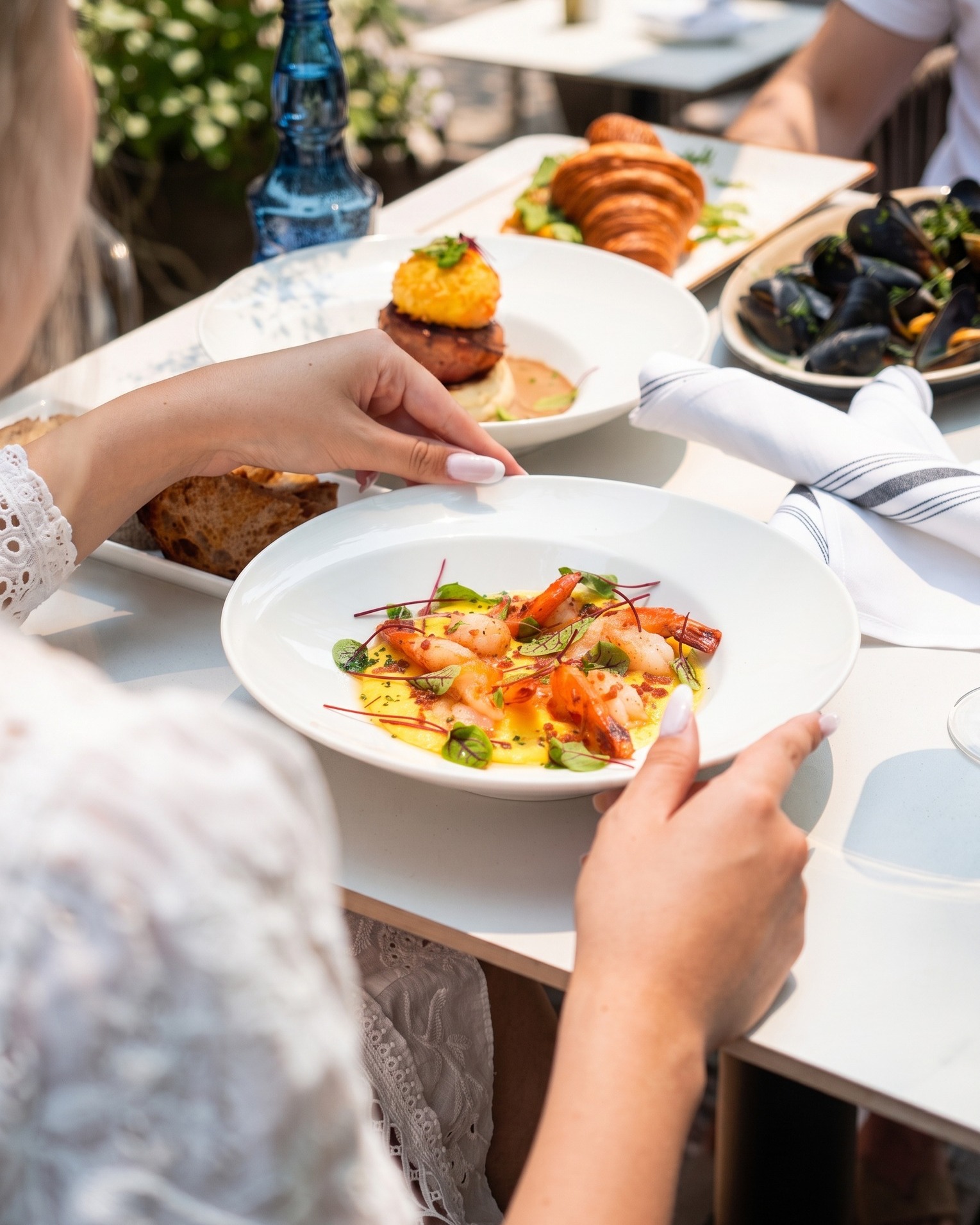 A table full of small plates, sunlight, no rush 🌿