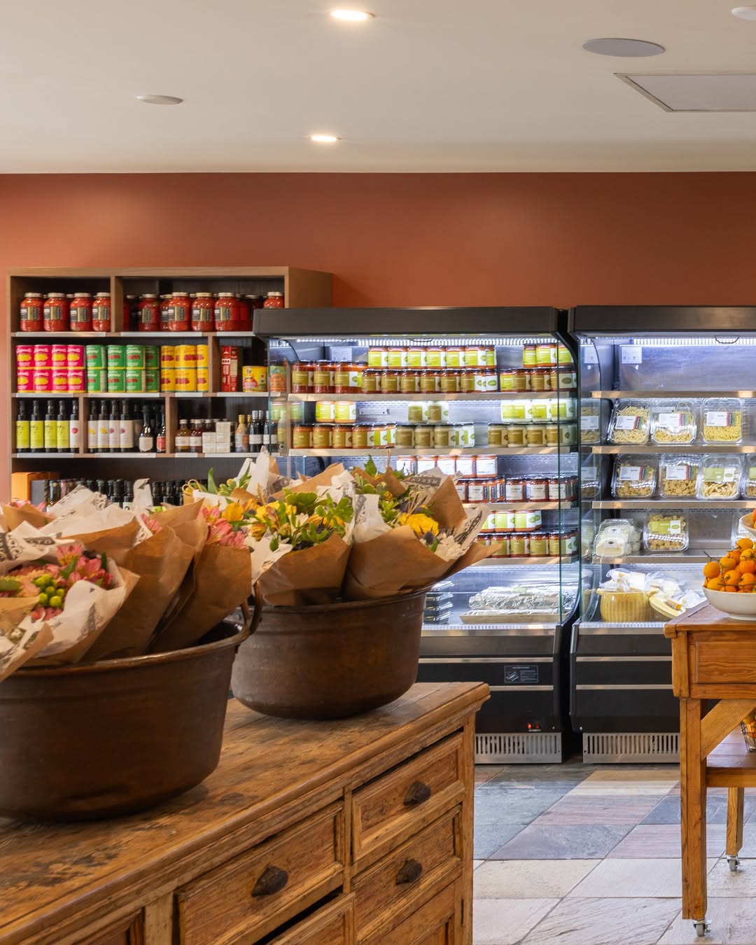 If you’ve stopped by recently, you’ll have seen the updates to the market. The shelves are full of produce, flowers and